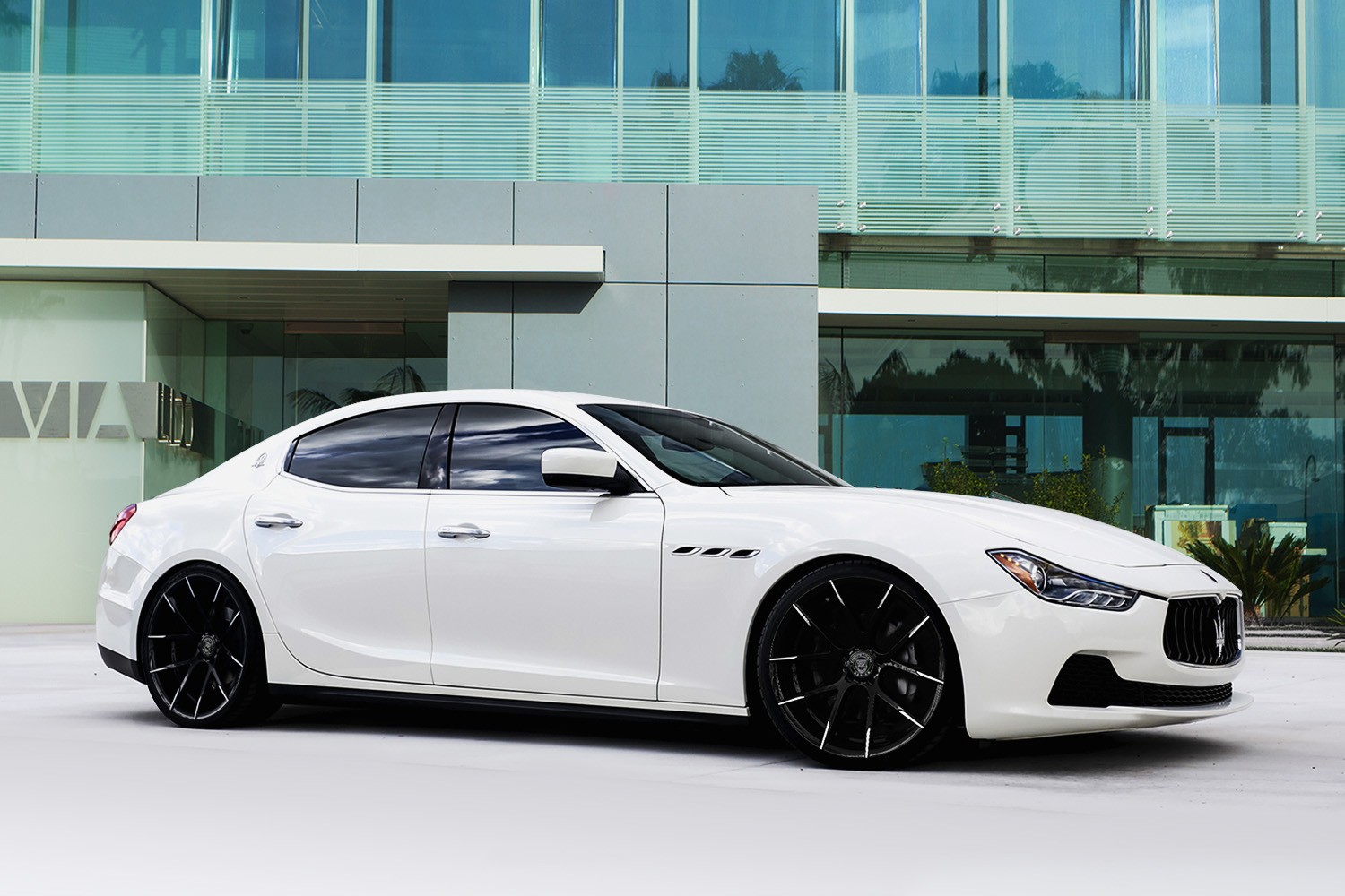 White Maserati Ghibli on black and white Stuttgart wheels